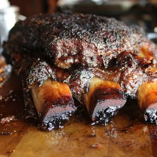 a pork roast on a wooden cutting board