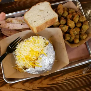 Turkey and baked potato, fried okra.