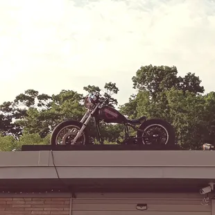 a motorcycle on top of a building
