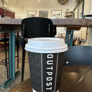 a coffee cup on a table