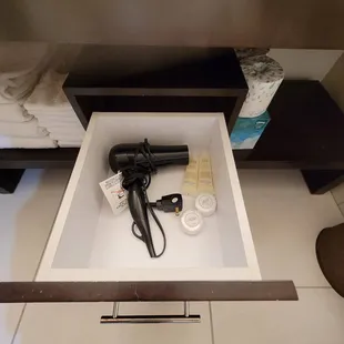 Comes with hair dryer and plenty of backup soap and shampoo