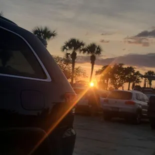 Sunset in parking lot.