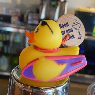 a rubber duck in a cup