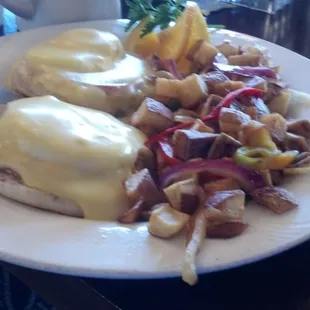 Poached eggs and homestyle potatoes.