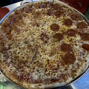 All the pizzas were half cheese, half pepperoni.