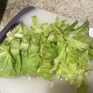 Lettuce that I had to cut up since the customer has to do it.