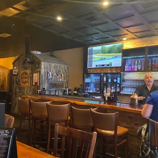 a man sitting at the bar