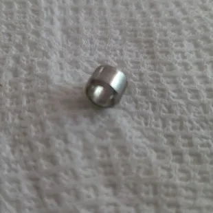 Metal found in wife's mashed potatoes... I'm surprised that the person putting on the lid did not notice it unless it was intentional!