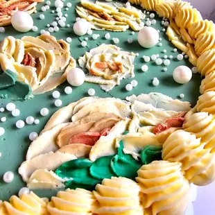 Handpainted buttercream roses.