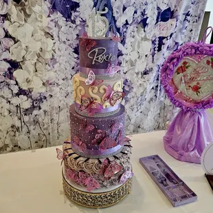 Purple butterfly Quinceanera cake.