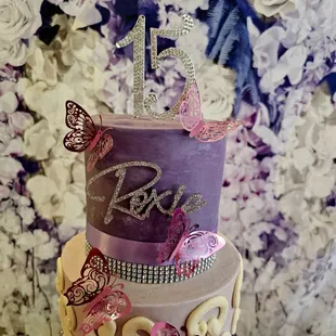 Purple butterfly Quinceanera cake.