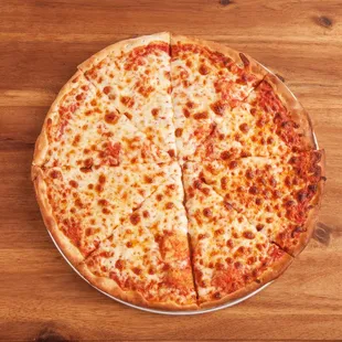 a cheese pizza on a wooden table