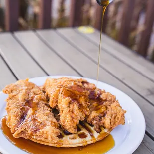 a plate of fried chicken and waffles