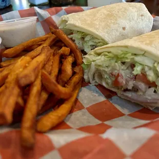 Chicken Caesar Wrap with the upgraded sweet potato fries ! Yummm!