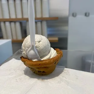 a scoop of ice cream in a cone
