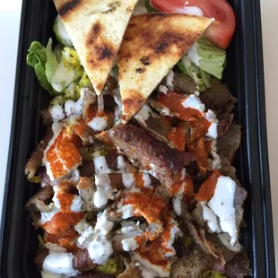 Lamb on top of rice!