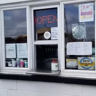 an open sign in a window