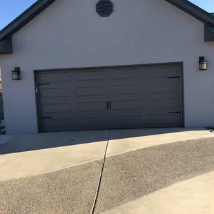 Merry Christmas to me. Cory and Jeff installed my new bead board design garage door today with black handle hardware. Job well done.