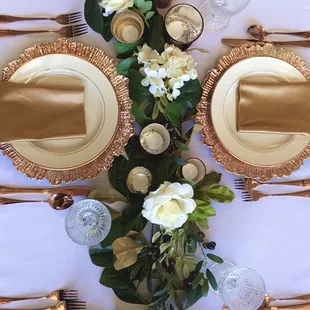 Our new Mixed Metals Collection. Sunburst Rose Chargers. Rose Gold Flatware. Gold Strike Mercury Votives. Vintage Crystal Goblets.