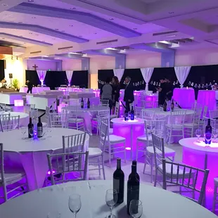 Winter Gala - Silver chiavari chairs, white satin linens with led table lights, white sofa lounge sets, black velour draping