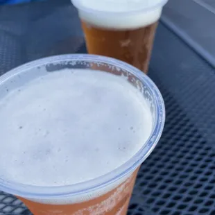 two cups of beer on a table