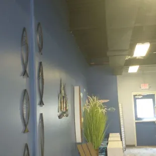 a hallway with a coffee machine and a coffee maker