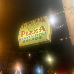 a neon sign for a restaurant
