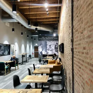 Seating area with the piano in the back.