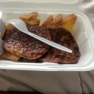 a container of food with a fork in it