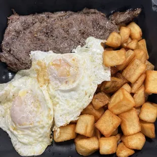 Steak, eggs, and breakfast potatoes