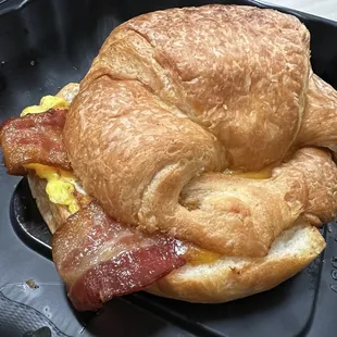 Breakfast sandwich on a croissant with bacon!