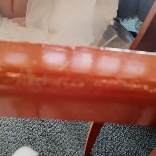 Worn out, banged up chairs. It's a good example of all of the furnishings I saw.