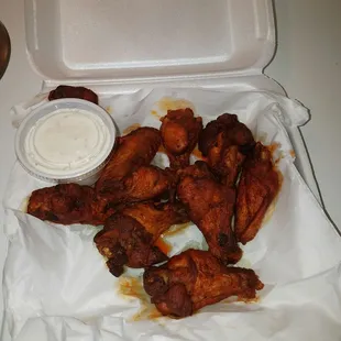Underestimated wings. It is a bar so drinking,smoking but the grub is pretty decent. Pairs well with a miller lite!