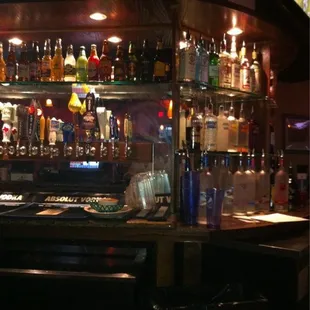 a bar with a lot of bottles