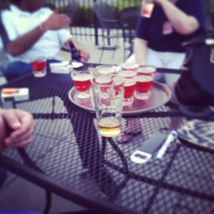 a group of people sitting around a table