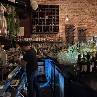 a bartender at the bar