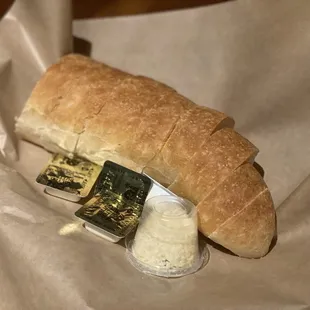 a baguet with cheese and bread