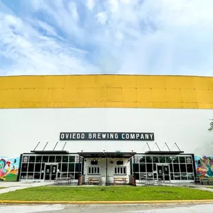 Front view with patio space and murals