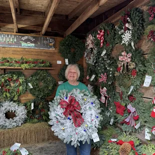 Barb holding a wreath she made!