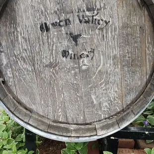 a wooden barrel in the garden