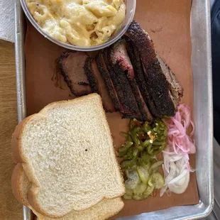 Sliced brisket plate with a medium Mac &amp; cheese