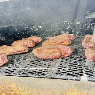 6/24 Prime-grade Creekstone brisket being slowly smoked in a 500 gallon offset smoker