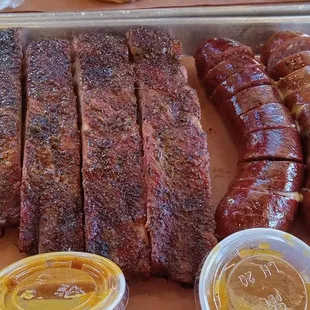 Half rack ribs with jalapeno and black and garlic sausage