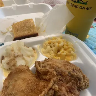 Fried chicken platter with mashed potatoes and Max and cheese and lovely corn bread