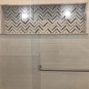 a shower with a glass door