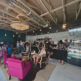 a group of people in a coffee shop