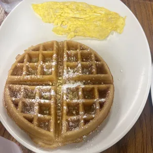 a waffle and eggs