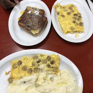 Turkey sausage links, cheese, fried onions omelette. Also cheese grits and French toast.