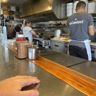 a man working in a restaurant kitchen