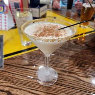 a drink in a martini glass